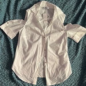 Bebe size small shoulder cut out blouse.